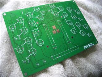 A bare production PCB fresh from fabrication
