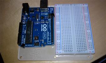 A development board and breadboard on the bench