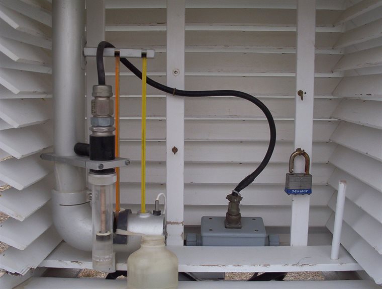 Meteorological instruments mounted inside a louvered Stevenson screen enclosure