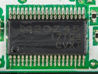 A Texas Instruments bq20Z45 battery management IC soldered on a circuit board